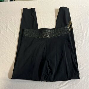 Nike Black and Gold Leggings in Size Medium